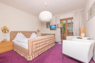 Ein Bett oder Betten in einem Zimmer der Unterkunft Hotel Furian