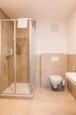 Ein Badezimmer in der Unterkunft Attergauhof