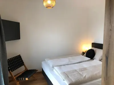 Ein Bett oder Betten in einem Zimmer der Unterkunft Ski & Nature Apartment
