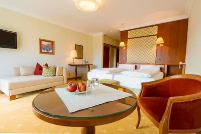 Ein Bett oder Betten in einem Zimmer der Unterkunft Hotel Hollweger
