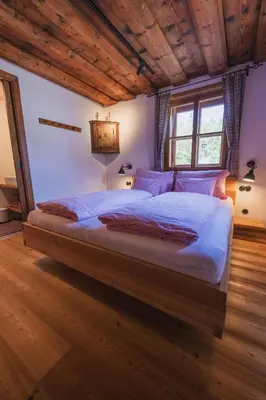 Ein Bett oder Betten in einem Zimmer der Unterkunft Schmiedgut Bad Aussee