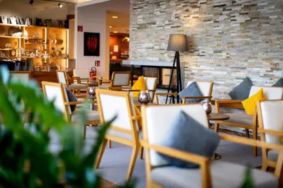 Ein Sitzbereich in der Unterkunft Hotel Auszeit St Lambrecht