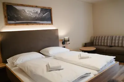 Ein Bett oder Betten in einem Zimmer der Unterkunft Obertrauner Hof