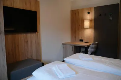 Ein Bett oder Betten in einem Zimmer der Unterkunft Obertrauner Hof