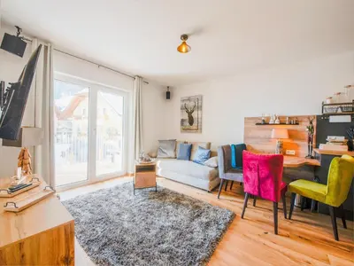 Ein Sitzbereich in der Unterkunft Ski-In Area Apartment with Ski Bus