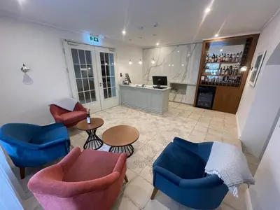 Ein Sitzbereich in der Unterkunft Hotel Radetzky