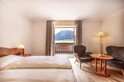 Ein Bett oder Betten in einem Zimmer der Unterkunft Hotel Weisser Hirsch