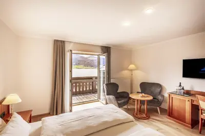 Ein Bett oder Betten in einem Zimmer der Unterkunft Hotel Weisser Hirsch