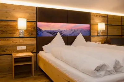 Ein Bett oder Betten in einem Zimmer der Unterkunft Hotel Gamsleiten