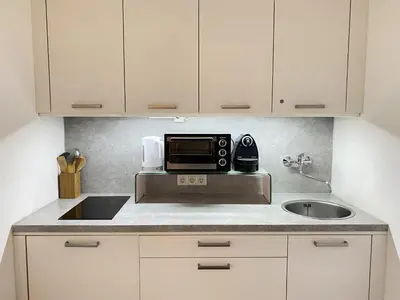 Küche/Küchenzeile in der Unterkunft Alpine Studio Apartment by AA Holiday Homes