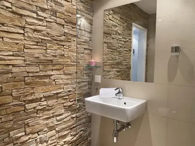 Ein Badezimmer in der Unterkunft Alpine Studio Apartment by AA Holiday Homes
