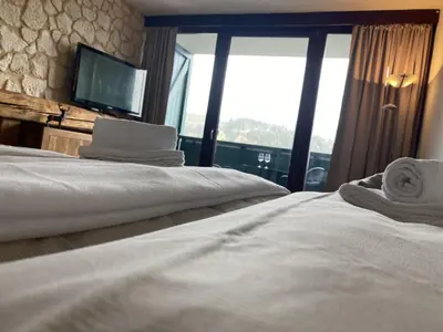 Ein Bett oder Betten in einem Zimmer der Unterkunft Alpine Studio Apartment by AA Holiday Homes