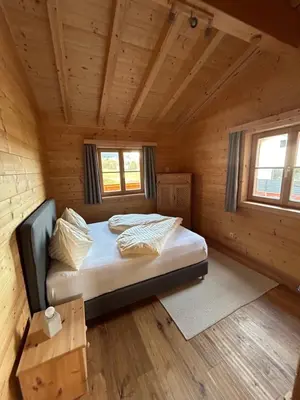 Ein Bett oder Betten in einem Zimmer der Unterkunft Chalet - Appartementhaus Alma