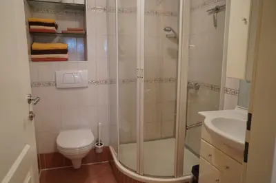 Ein Badezimmer in der Unterkunft Appartement Genigau