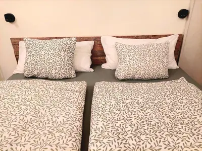 Ein Bett oder Betten in einem Zimmer der Unterkunft Appartement Genigau