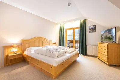 Ein Bett oder Betten in einem Zimmer der Unterkunft Apparthaus Sonnenberg