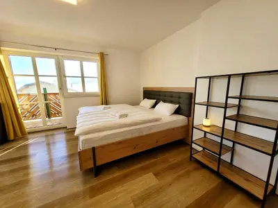 Ein Bett oder Betten in einem Zimmer der Unterkunft Ferienwohnung Flachau Oberlehengut