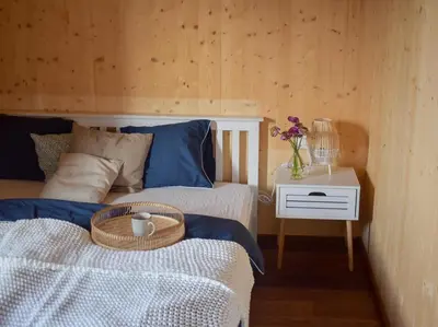 Ein Bett oder Betten in einem Zimmer der Unterkunft Ferienhaus mit Charme