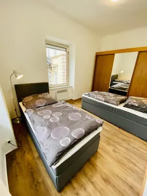 Ein Bett oder Betten in einem Zimmer der Unterkunft Abschalten im Zentrum von Bad Ischl