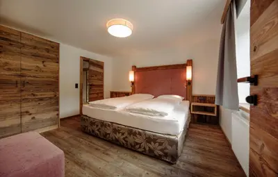 Ein Bett oder Betten in einem Zimmer der Unterkunft Alpin Apartement G'ret