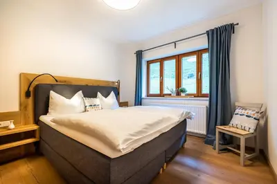 Ein Bett oder Betten in einem Zimmer der Unterkunft Urlaubsparadies Bogenhof - 5 Minuten zum Lift