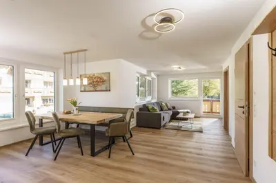 Ein Sitzbereich in der Unterkunft Deluxe Appartement Blasbichlerhof
