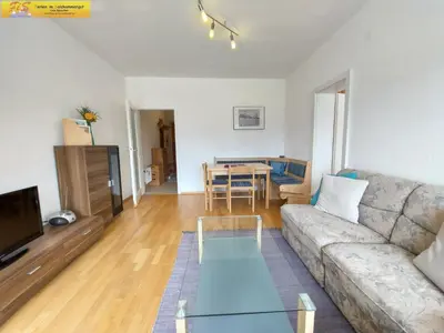 Ein Sitzbereich in der Unterkunft Apartment Toni
