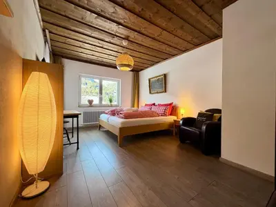 Ein Bett oder Betten in einem Zimmer der Unterkunft Boutique Hotel Alpenhof