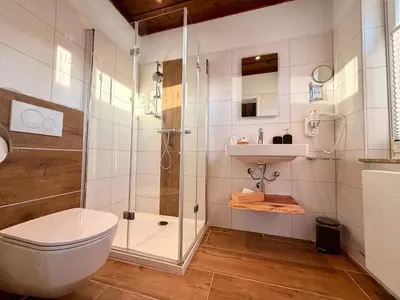 Ein Badezimmer in der Unterkunft Boutique Hotel Alpenhof