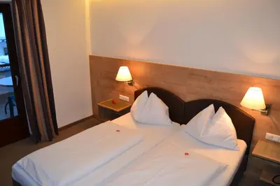Ein Bett oder Betten in einem Zimmer der Unterkunft Gästehaus Elisabeth