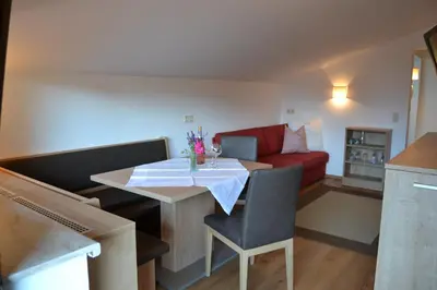 Ein Sitzbereich in der Unterkunft Gästehaus Elisabeth