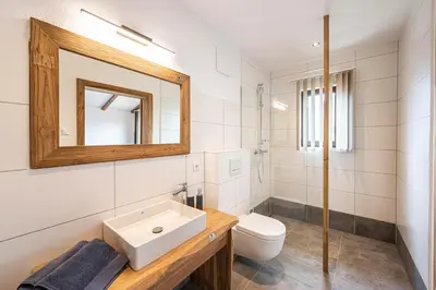 Ein Badezimmer in der Unterkunft Almdorf Auszeit Fageralm