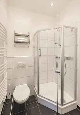 Ein Badezimmer in der Unterkunft Appartement Tamino - City Appartement by Schladmingurlaub