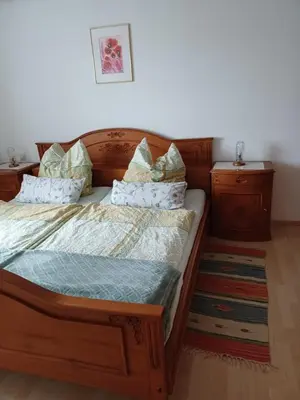 Ein Bett oder Betten in einem Zimmer der Unterkunft Bergruhe