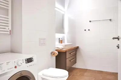 Ein Badezimmer in der Unterkunft Adler Lodge D5