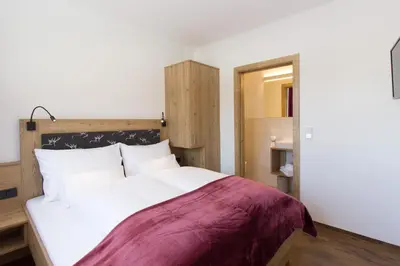 Ein Bett oder Betten in einem Zimmer der Unterkunft Reinthalers