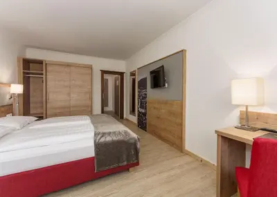 Ein Bett oder Betten in einem Zimmer der Unterkunft Kirchenwirt Schladming