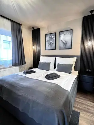 Ein Bett oder Betten in einem Zimmer der Unterkunft The Steakhouse - Guest Rooms