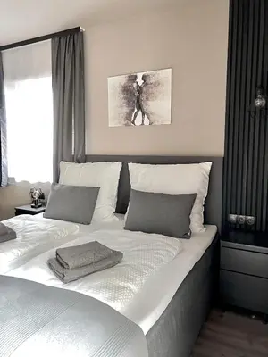 Ein Bett oder Betten in einem Zimmer der Unterkunft The Steakhouse - Guest Rooms