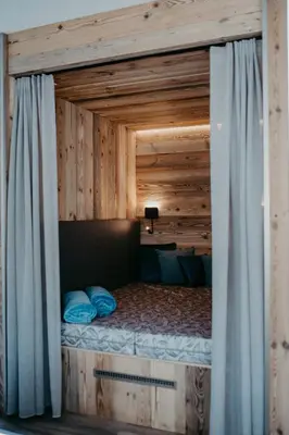 Ein Bett oder Betten in einem Zimmer der Unterkunft Brückenwirt's Ferienwohnung