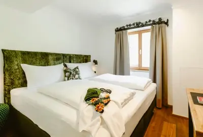 Ein Bett oder Betten in einem Zimmer der Unterkunft Seehotel Berau