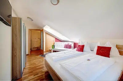 Ein Bett oder Betten in einem Zimmer der Unterkunft Hotel Bürglstein