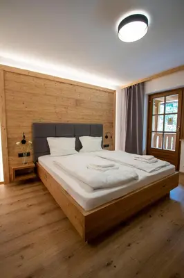Ein Bett oder Betten in einem Zimmer der Unterkunft Sporthotel Dachstein West