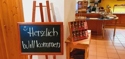 Ein Zertifikat, Auszeichnung, Logo oder anderes Dokument, das in der Unterkunft Sporthotel Dachstein West ausgestellt ist