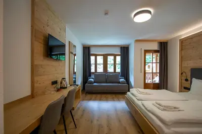 Ein Bett oder Betten in einem Zimmer der Unterkunft Sporthotel Dachstein West