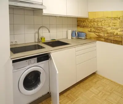 Küche/Küchenzeile in der Unterkunft Convenient and Functional Apartment in the Center