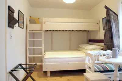 Ein Bett oder Betten in einem Zimmer der Unterkunft Wanderlust Boutique Rooms