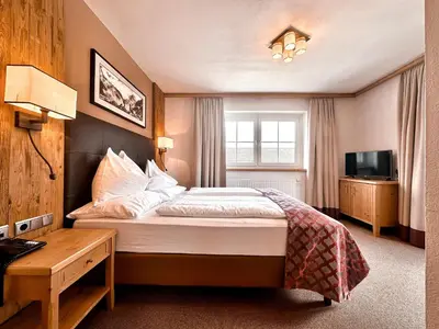 Ein Bett oder Betten in einem Zimmer der Unterkunft Hotel Das Urbisgut