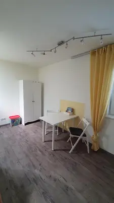 Ein Sitzbereich in der Unterkunft Ferienwohnung am Mondsee