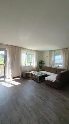 Ein Sitzbereich in der Unterkunft Ferienwohnung am Mondsee